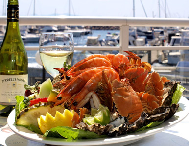 Fresh fish platter and a bottle of wine